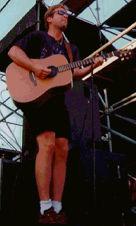 San with a guitar